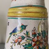 Old ceramic pitcher (18th century?) decorated with polychrome exotic birds