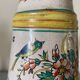 Old ceramic pitcher (18th century?) decorated with polychrome exotic birds
