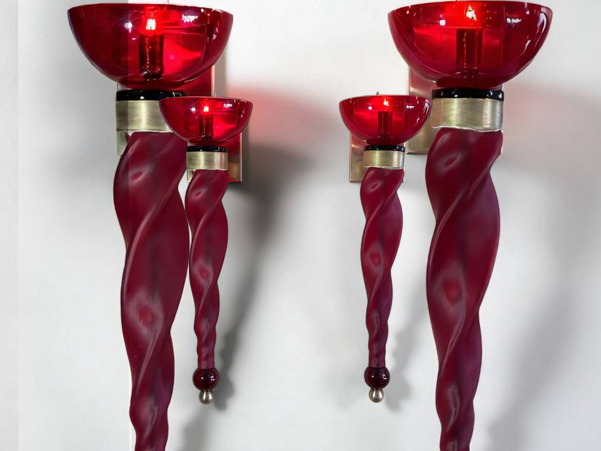 Pair of 62 cm murano torchere wall lights in red tinted glass and brass