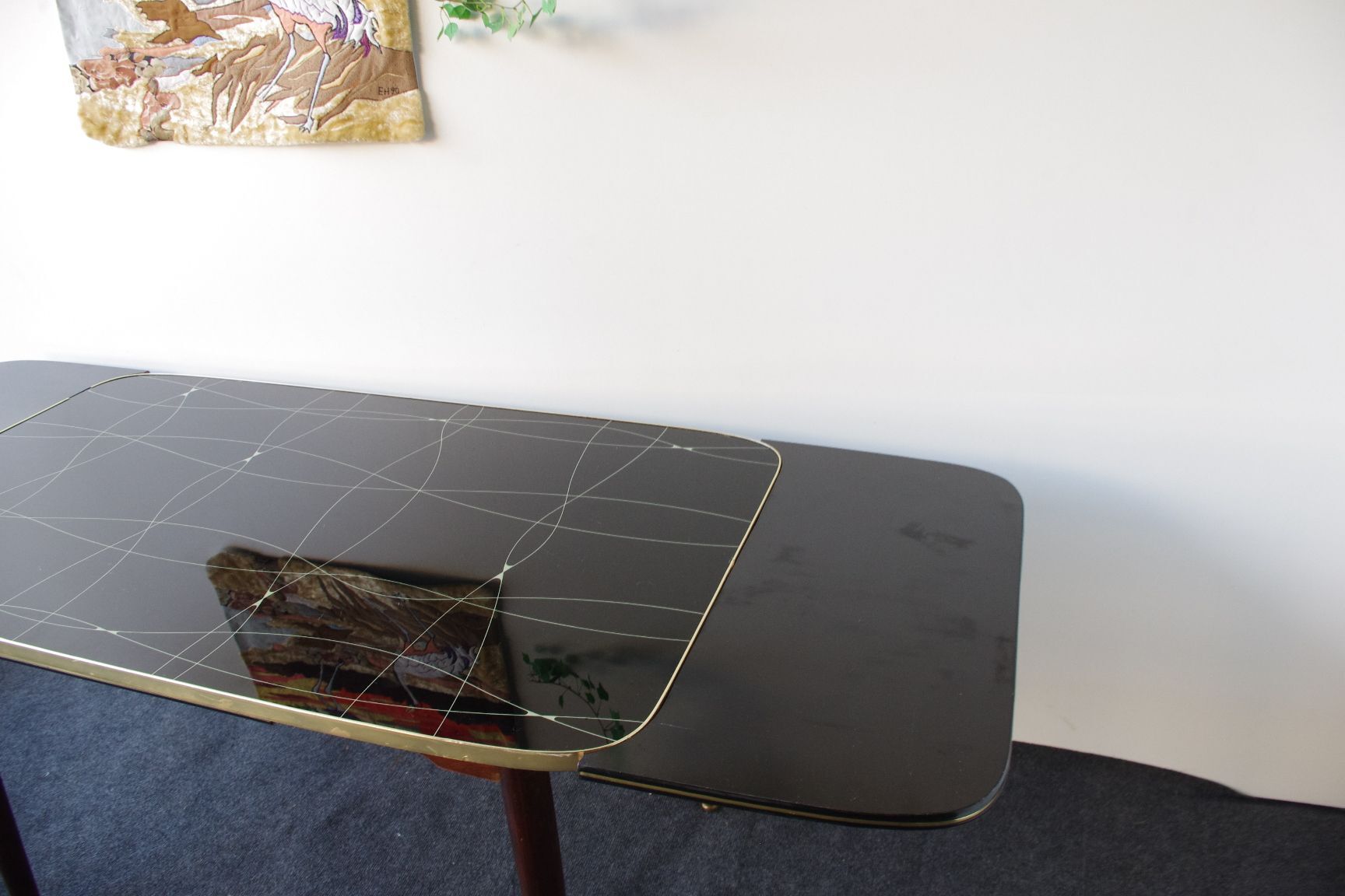 Folding table with black and gold painted glass, 1950