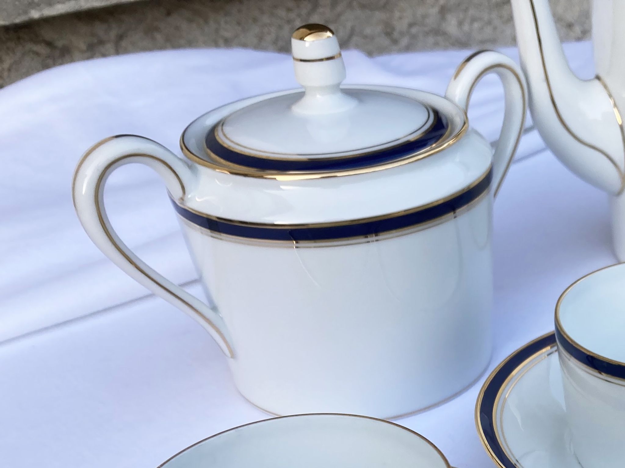 Haviland tea service in white limoges porcelain with navy blue net and gold model embassy