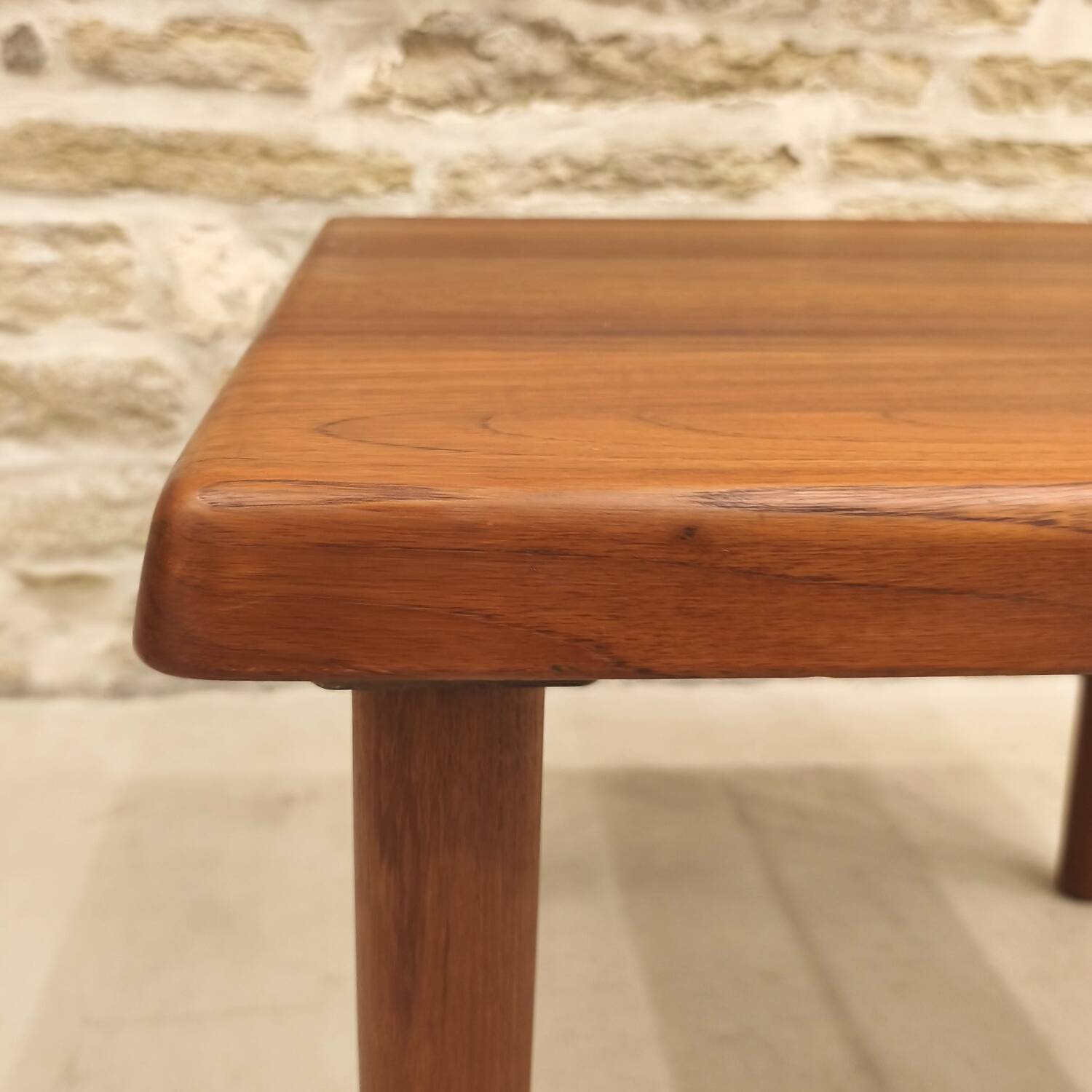 Teak coffee table designed by Niels Bach, Danish production.