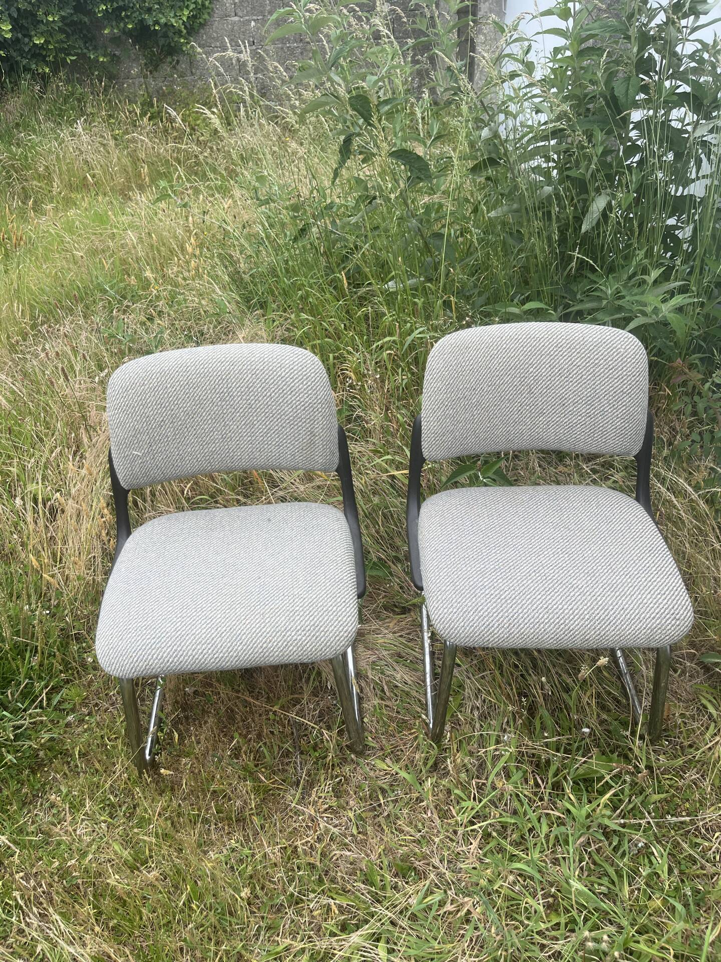 Set of two 1970s tweed armchairs.