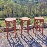 3 wooden and cane bar stools