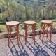 3 wooden bar stools with caning