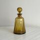 Twisted amber glass carafe