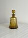 Twisted amber glass carafe