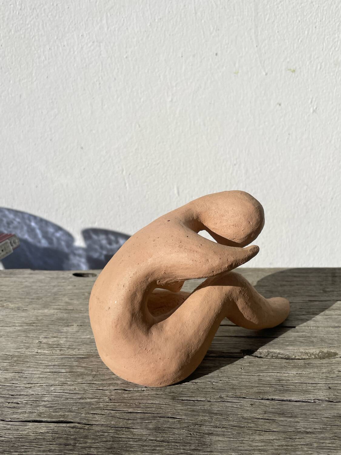 Terracotta sculpture figurine of a woman