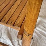 Old varnished wooden folding chair for children