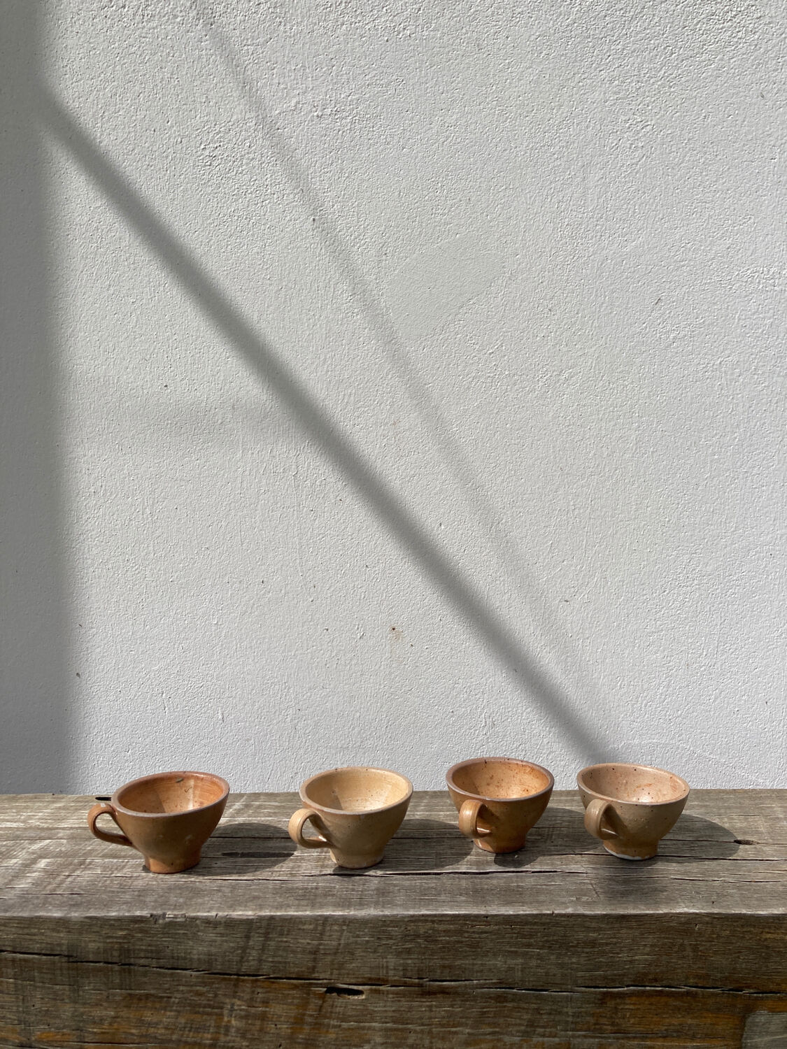 4 vintage stoneware cups