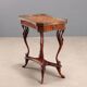 Small antique coffee table made of fruitwood and rosewood, 20th century.