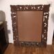 Renaissance style mirror in carved wood