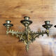 Elegant pair of three-light wall sconces from the 19th century.
