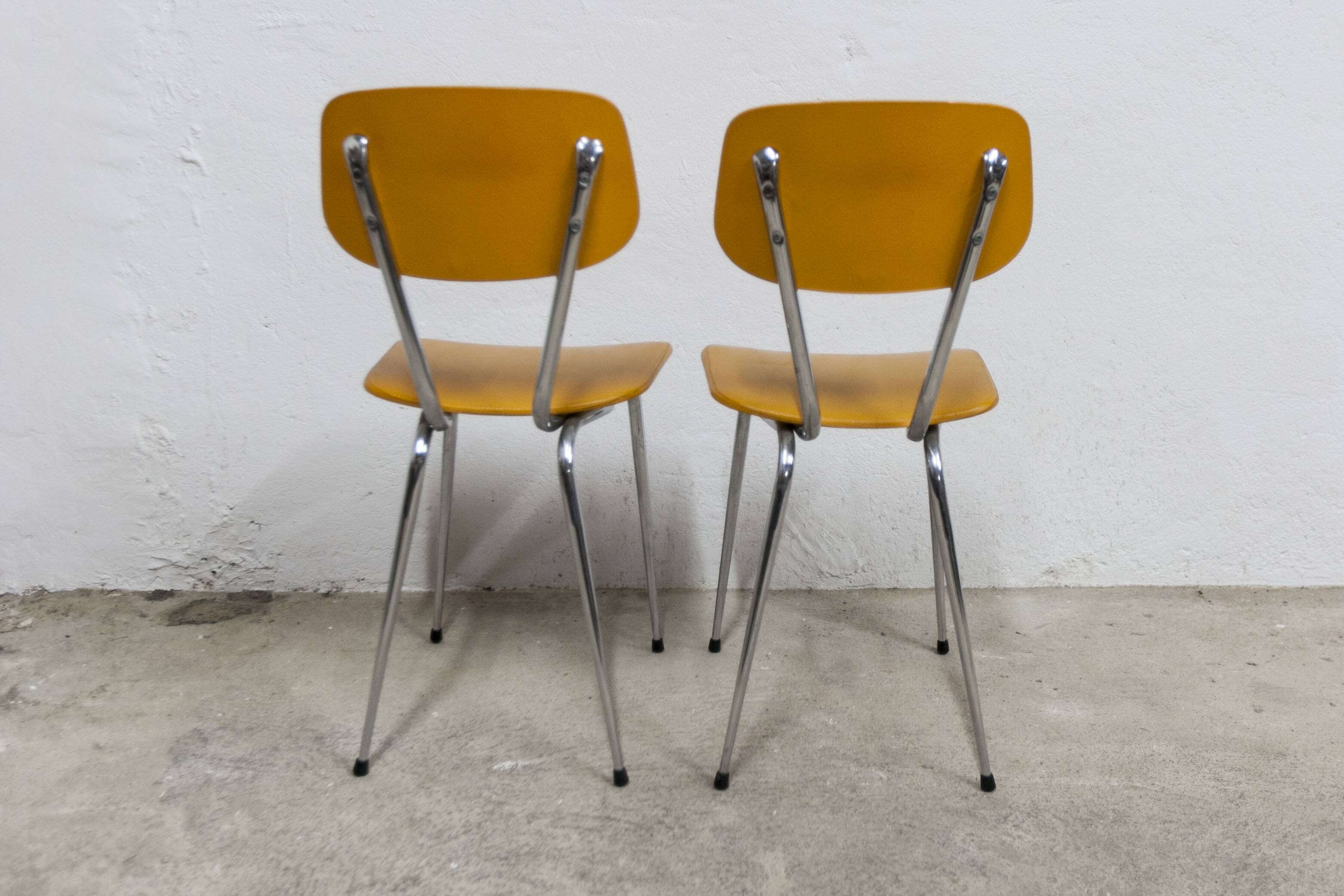 Pair of mustard-colored 70s welded Skai chairs