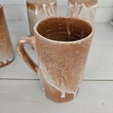 Set of 5 vintage handcrafted stoneware mugs in beige, pink, and white glazed stoneware