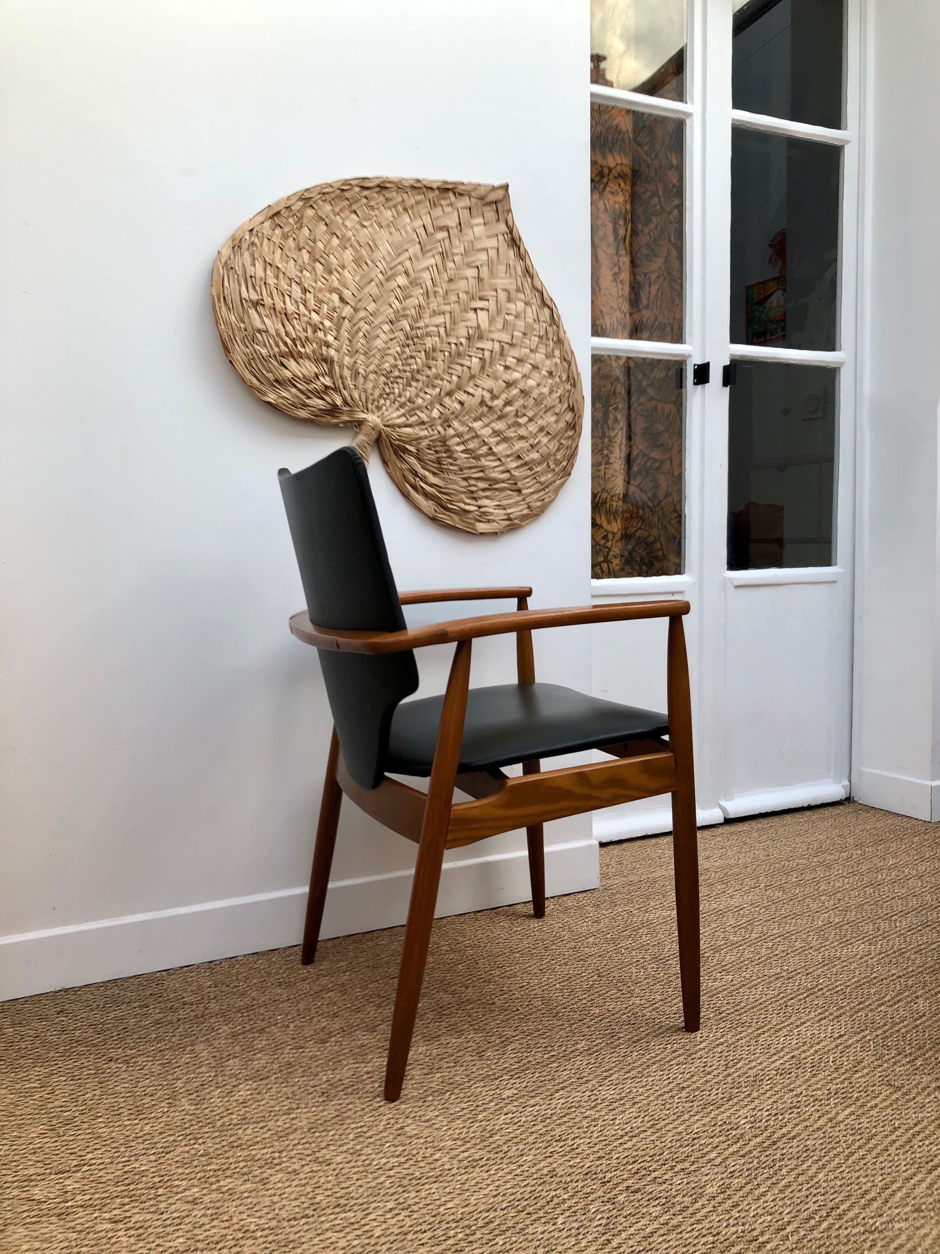 Teak and black vinyl chair 1960s