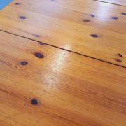 Suite of a round table with extension and 4 vintage pine chairs from the 60s and 70s
