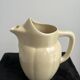 Ivory ceramic jug "La Sté Uzienne"
