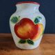 White Ceramic Vase with Peach and Leaf Motifs