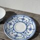 Pair of signed blue porcelain cups