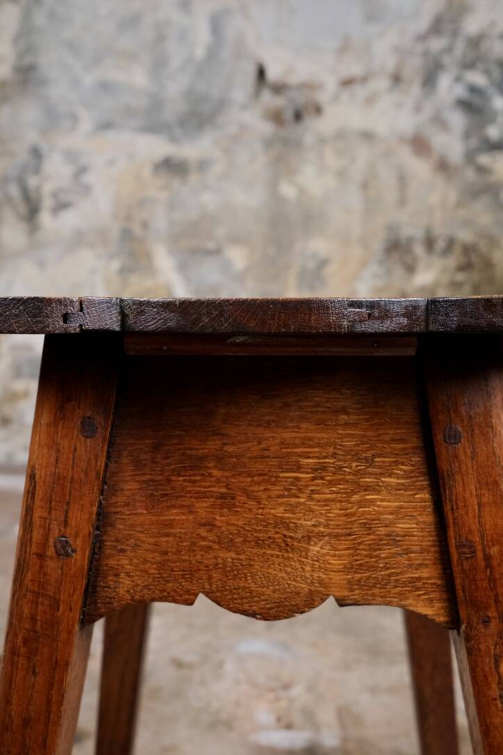 Pair of scalloped oak stools, France, early 20th century