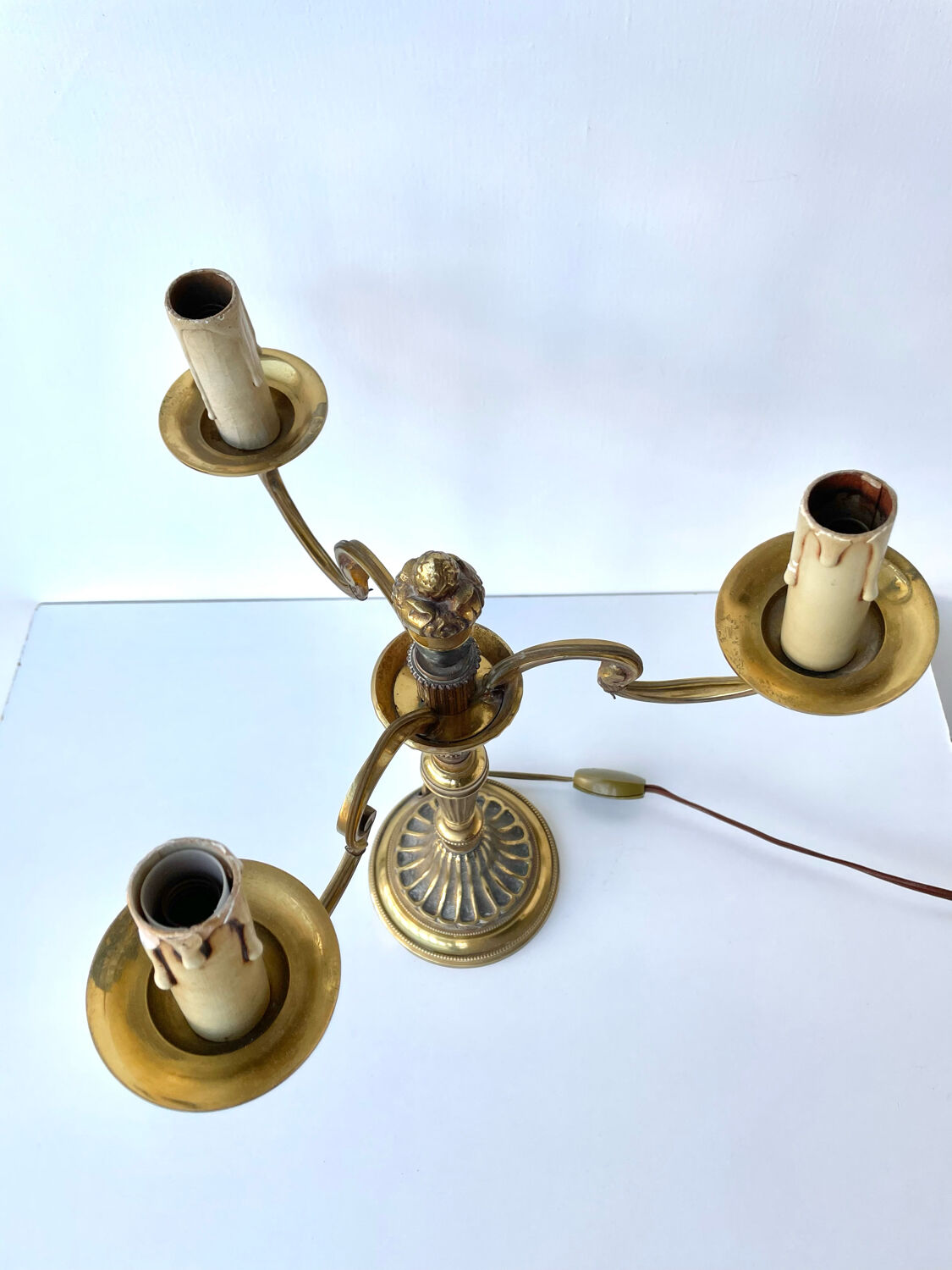 Three-branched golden candlestick