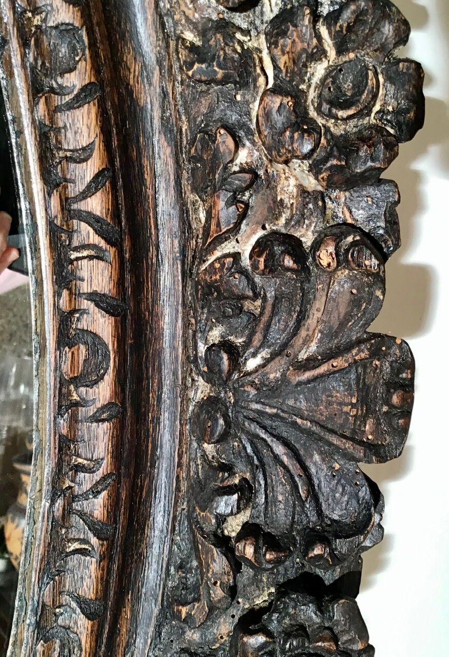 Oval mirror on an 18th century frame