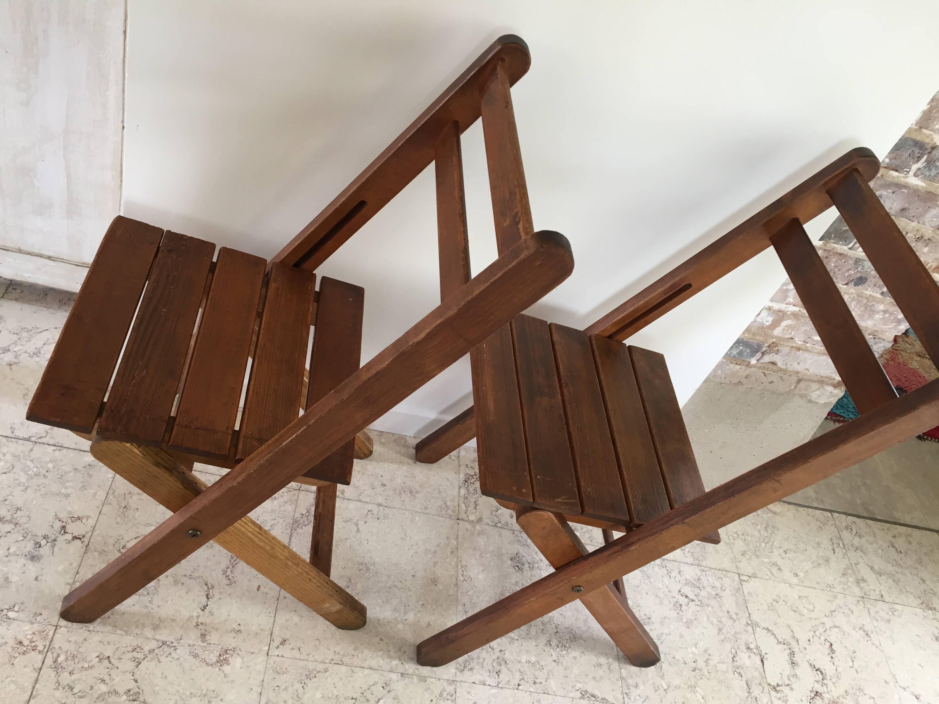 Folding chairs "by the wood fire"