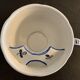 Old mustache cup and its under cup, Rouen earthenware