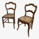 Paire de chaises rustiques cannées