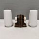 Old bathroom lamp with brown/golden ceramic base, porcelain socket and milky white glass