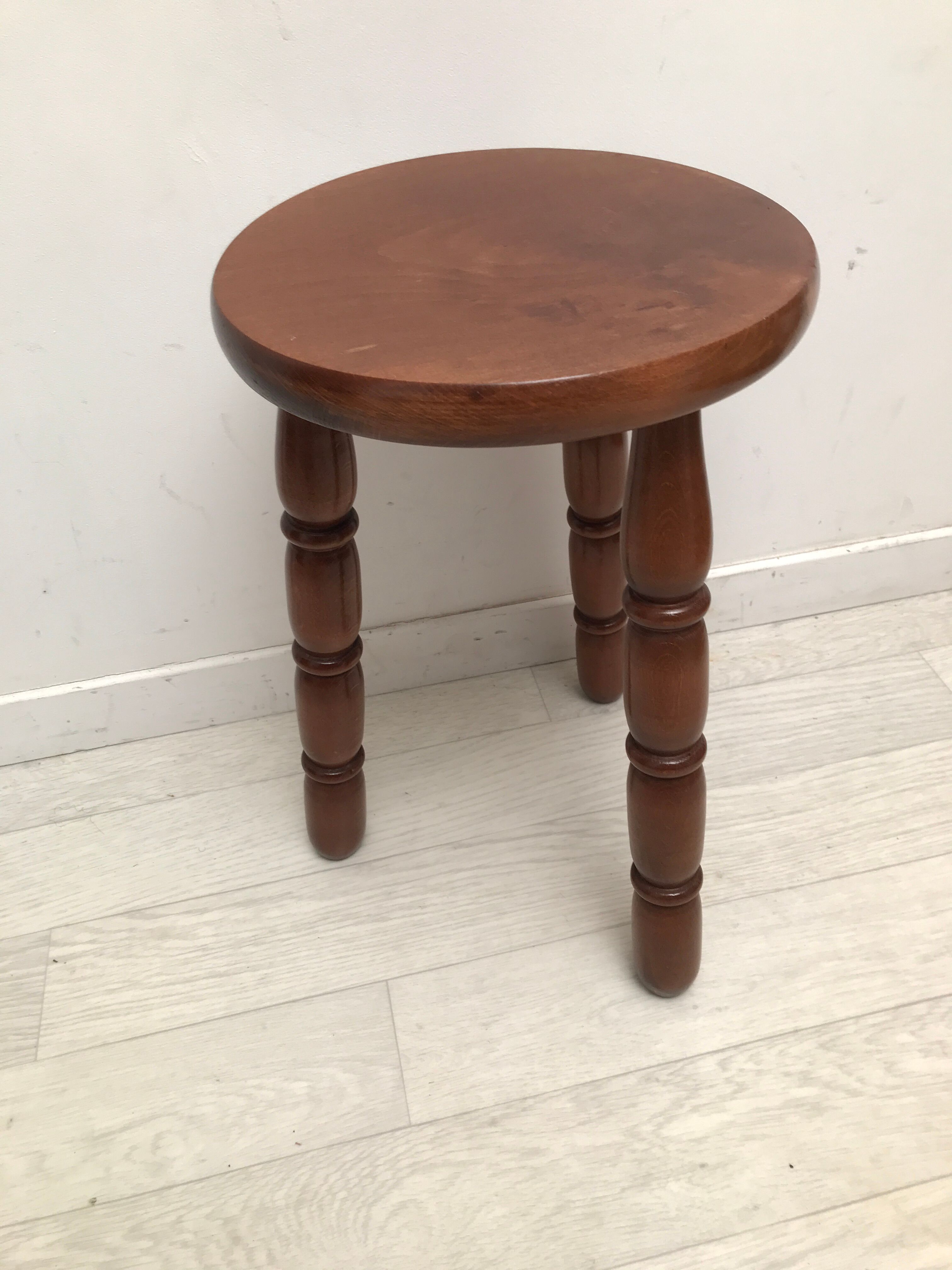Wooden stool turned tripod foot