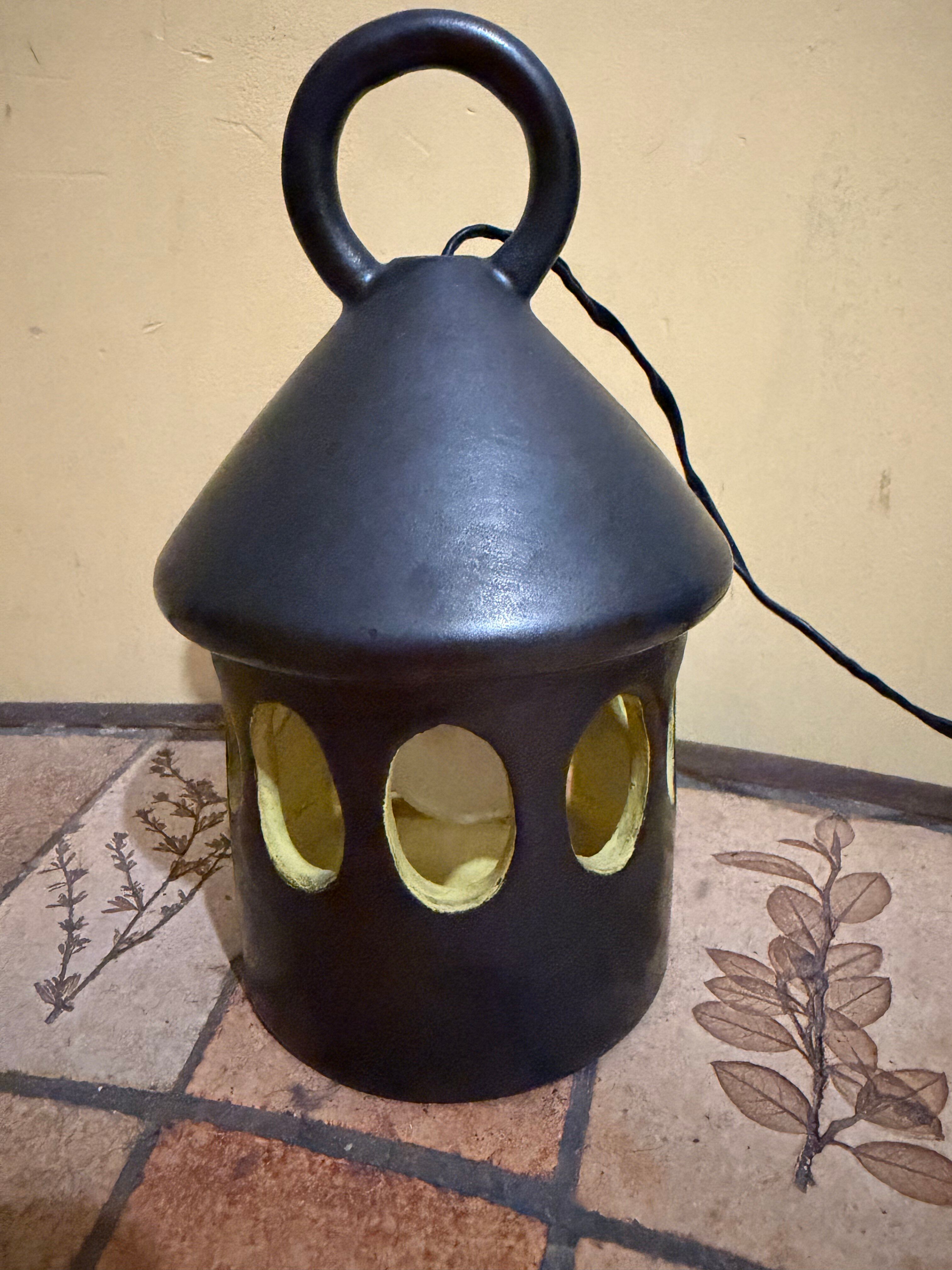 Black and yellow ceramic lantern hut signed by Claude Tabet d'Art.