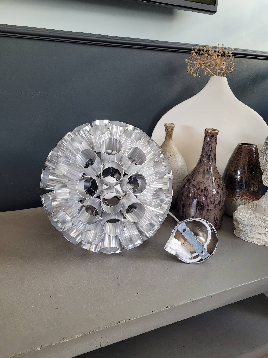 Space-age aluminum pendant light