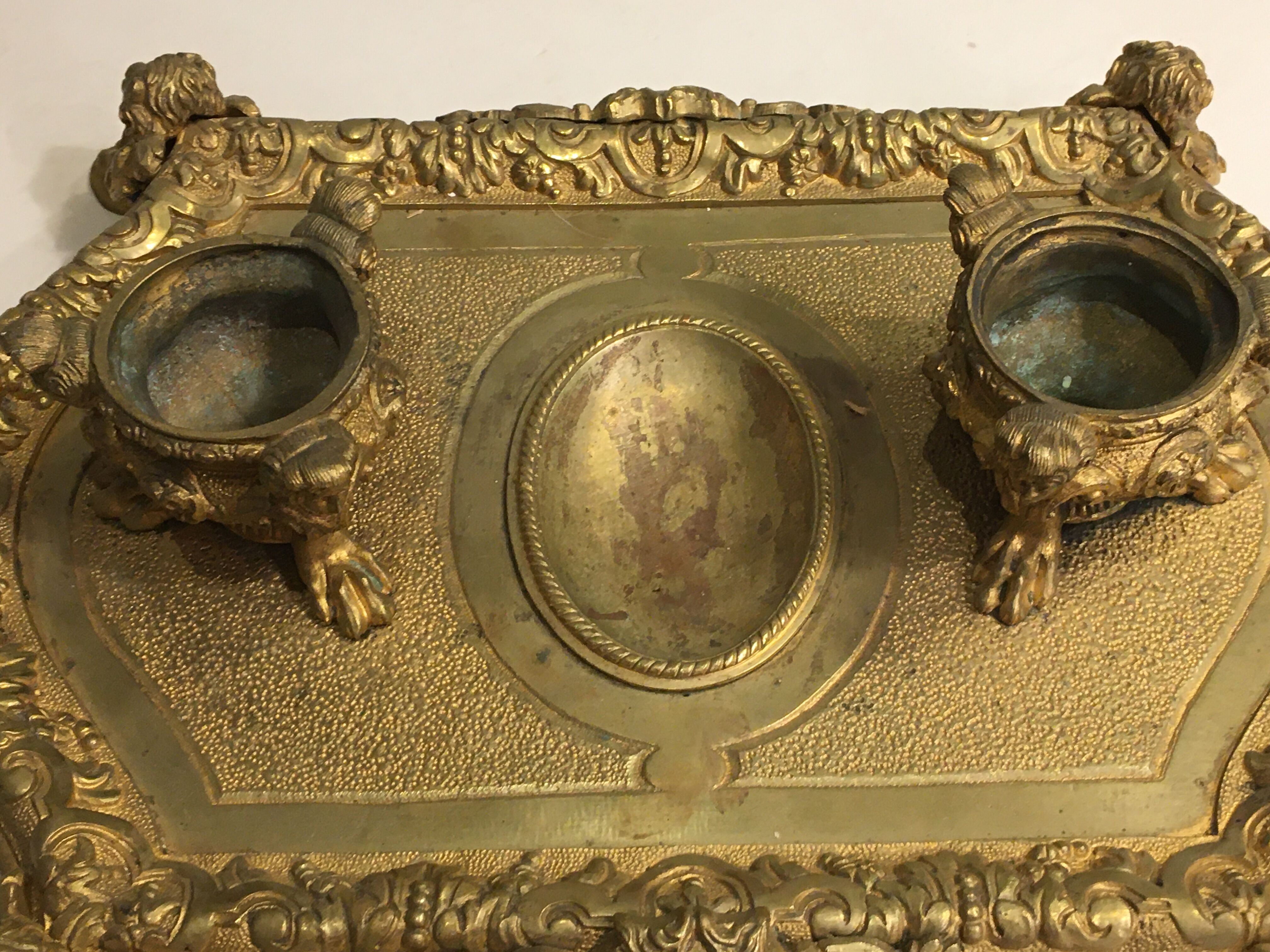 Ink bronze chiseled and gilded 19th