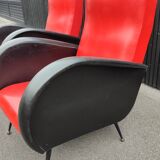 Pair of red and black faux leather armchairs