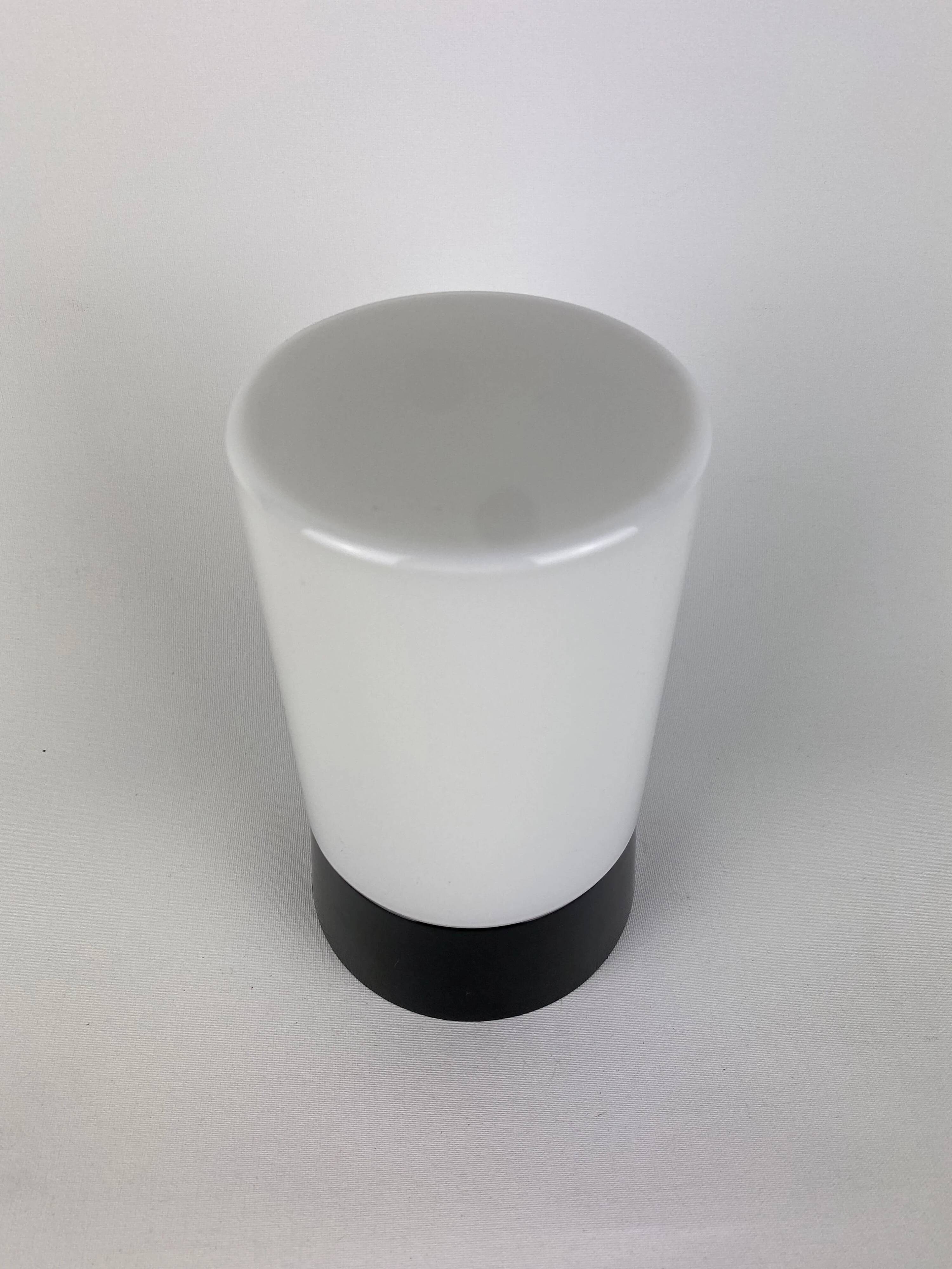 White cylindrical Art Deco chandelier RAAK with black support.