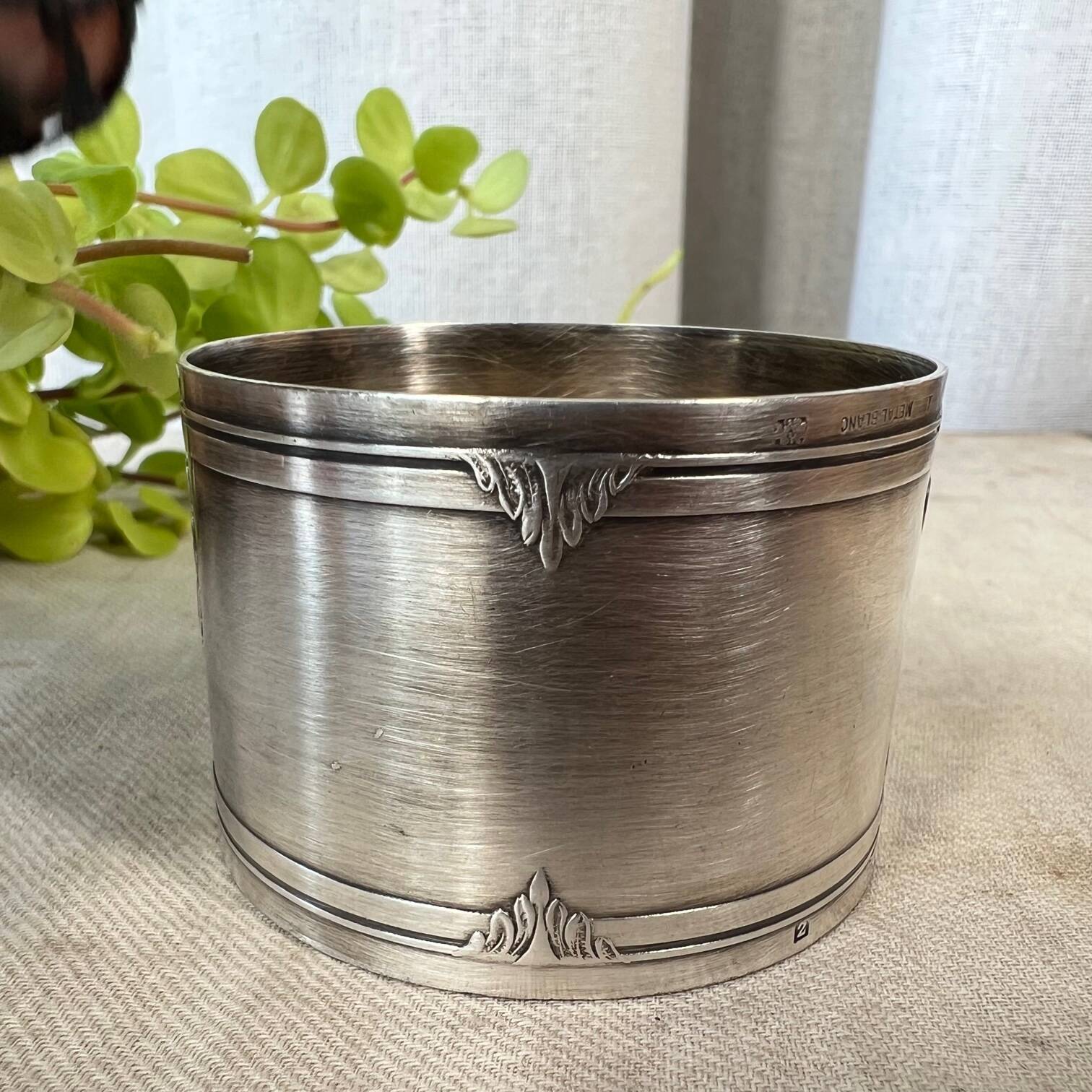 White metal napkin ring