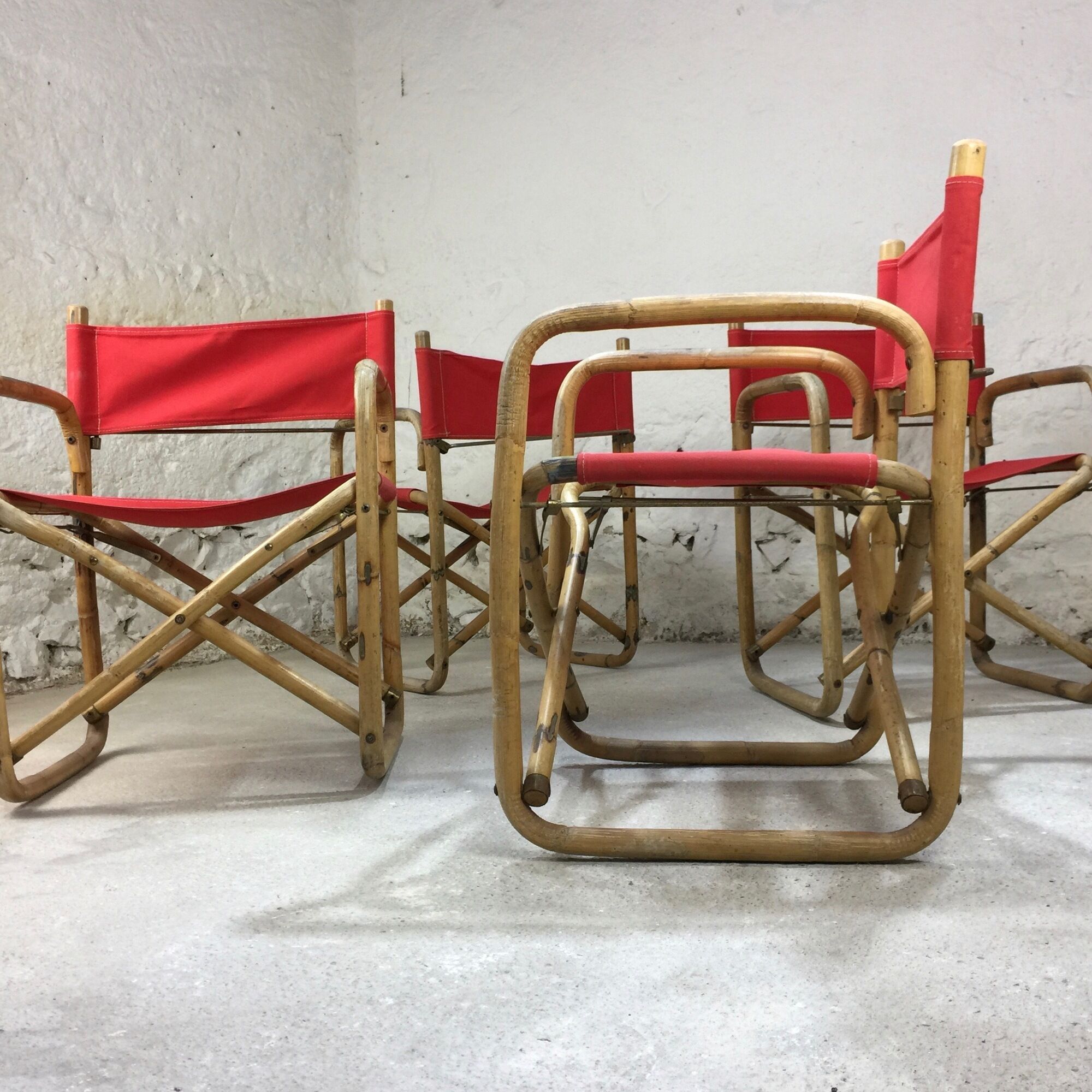 Lot of 4 chairs in rattan and red fabric, folding, 1960s