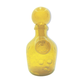 Yellow glass carafe with bubble details