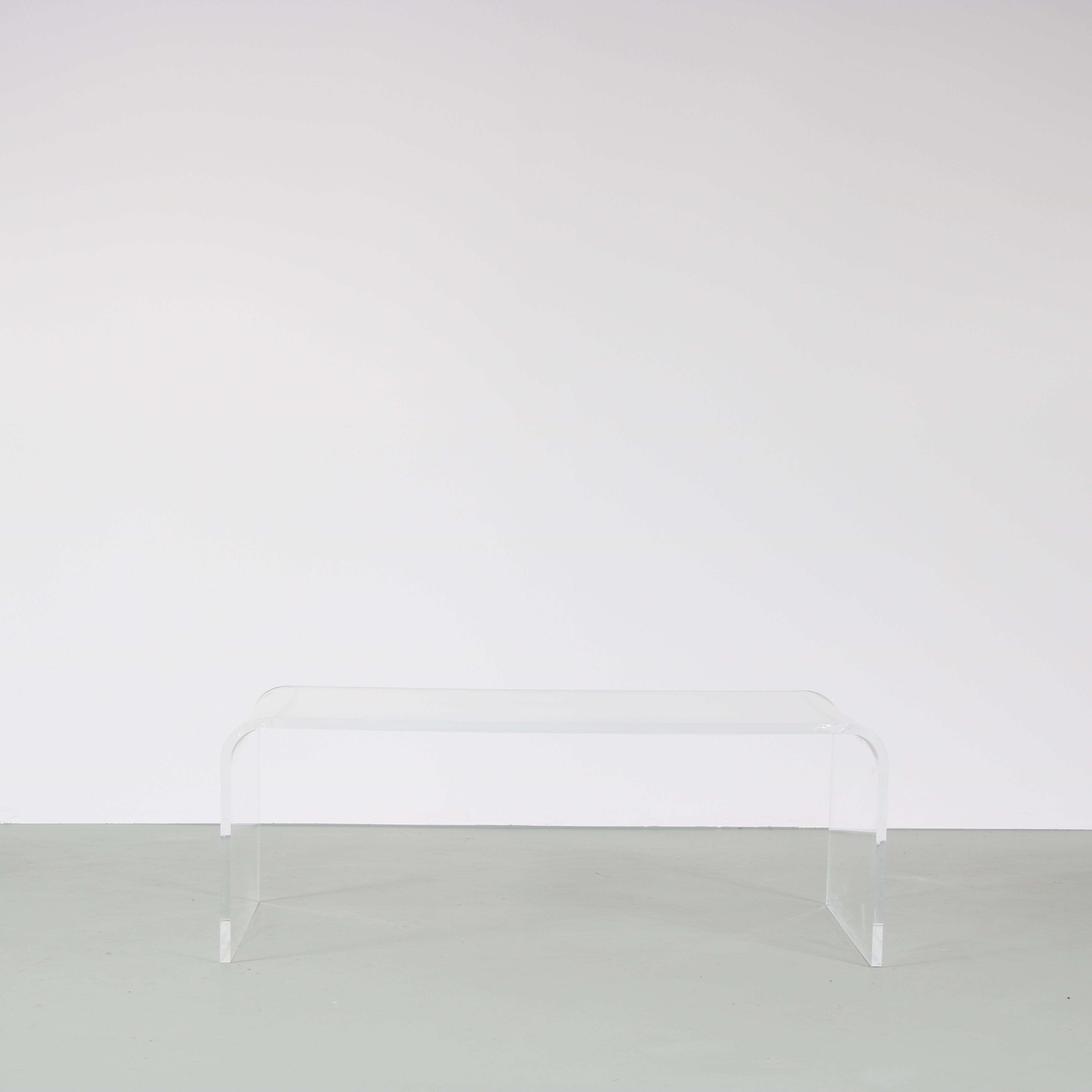 1970s Bent plexiglass coffee table from France
