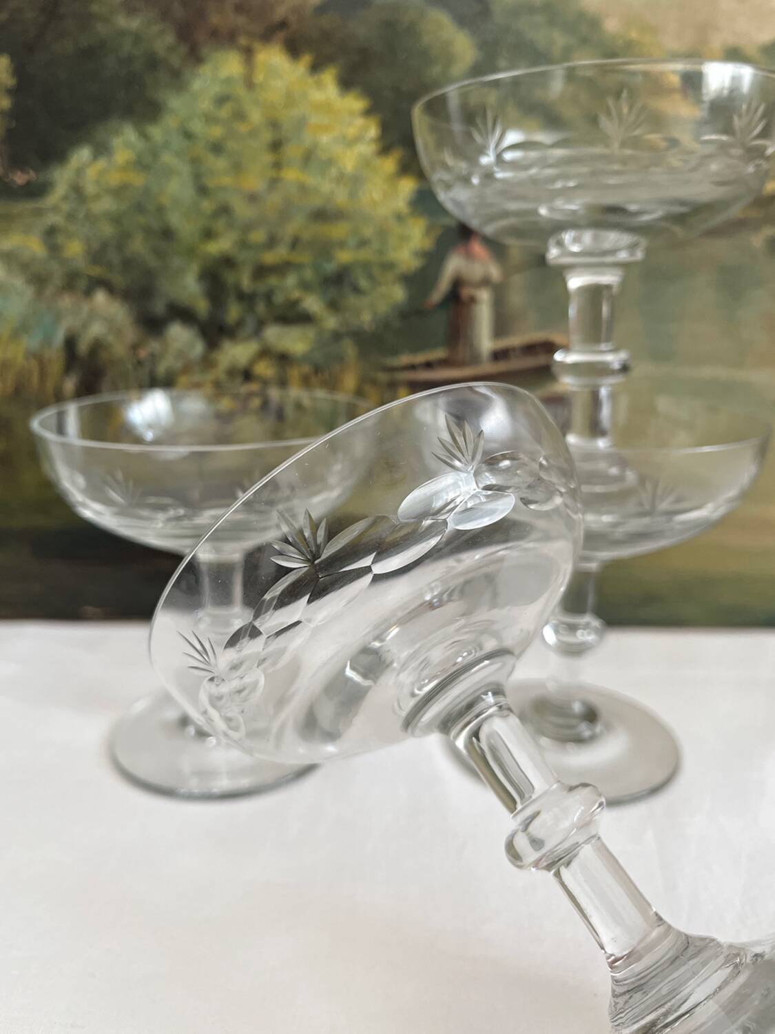 4 antique champagne glasses in engraved glass decor