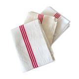 old mixed-race cotton tea towels with red bedding