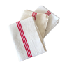 old mixed-race cotton tea towels with red bedding