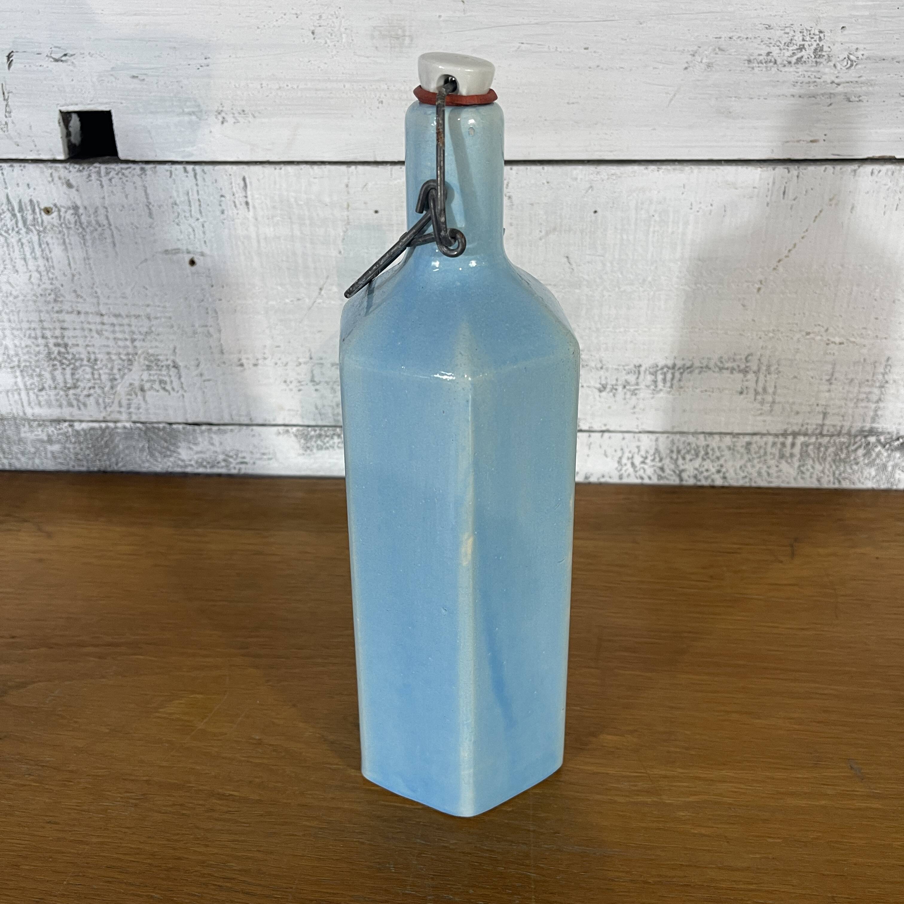 Blue glazed stoneware bottle