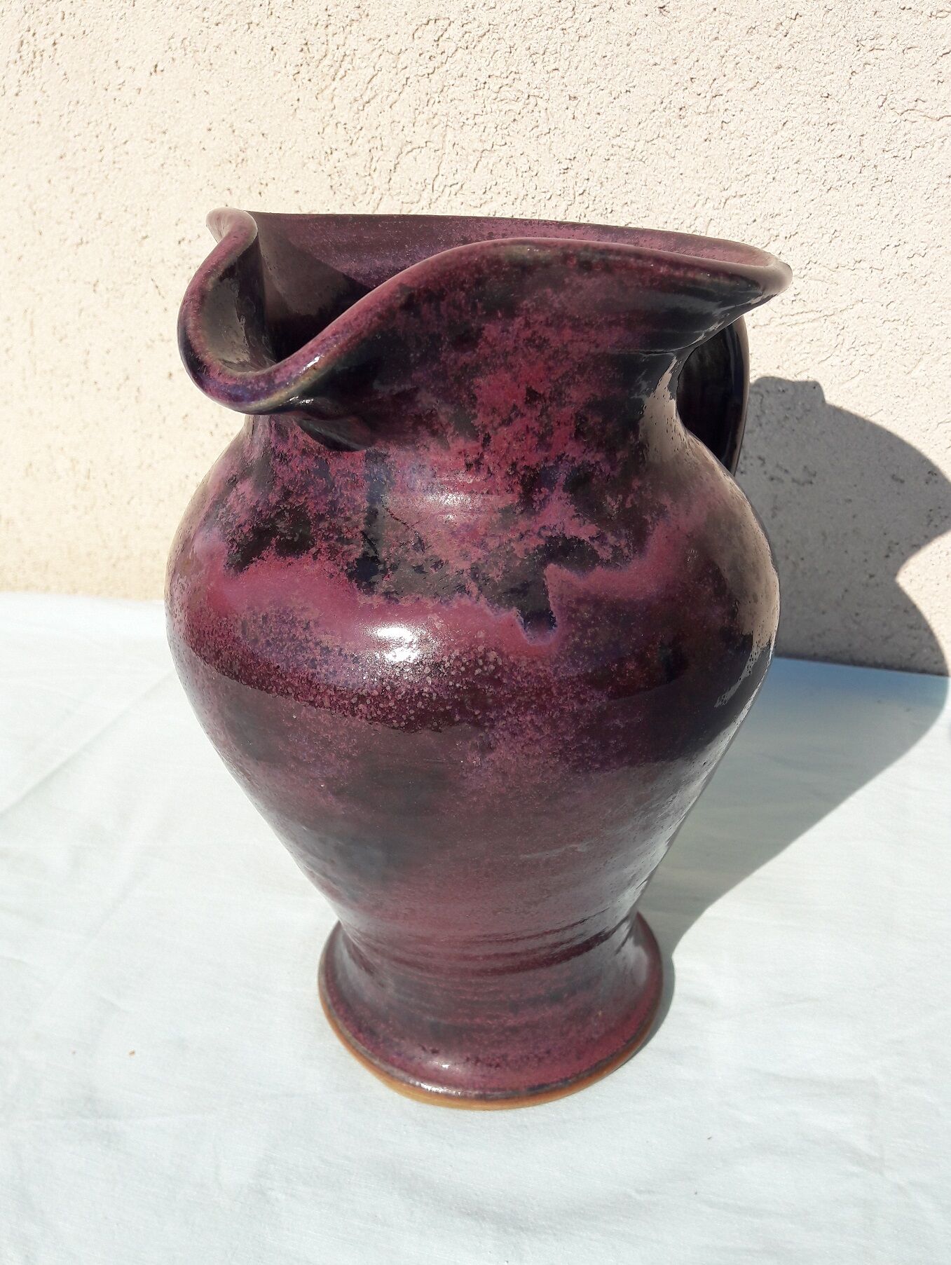 Signed ceramic pitcher