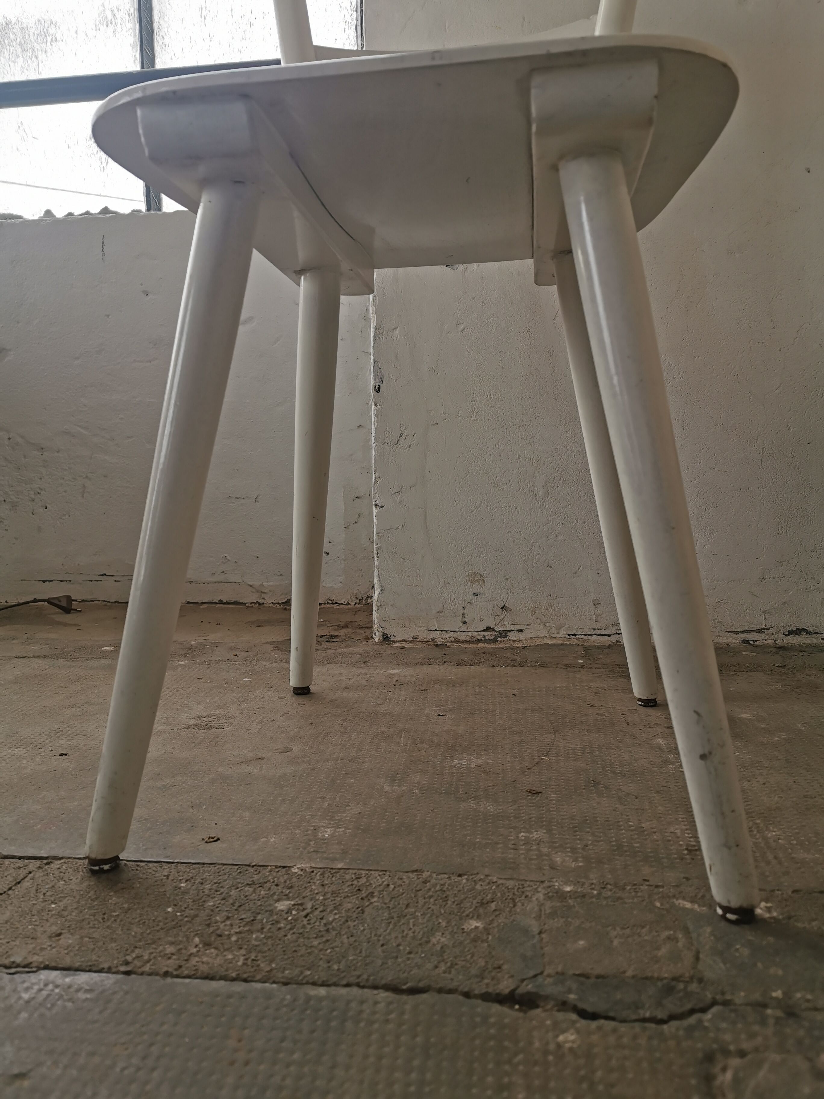 Set of 6 mismatched white chairs