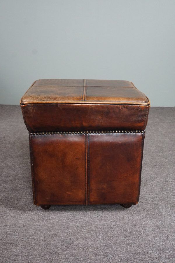 Armchair + sheepskin pouf