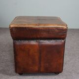 Armchair + sheepskin pouf