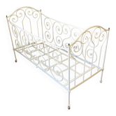 White wrought iron folding bed